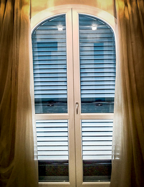 Portafinestra centinata in PVC a due ante Portafinestra centinata in PVC a due ante